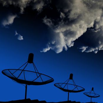 Trouble for radio wave, Satellite dishes on rooftop with cloud in night sky