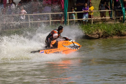 SARABURI THAILAND-JANUARY 20: Boonlue Korbangyang in action during show Freestyle the Jet ski  stunt action  on Jan 20, 2013 in SARABURI,Thailand.