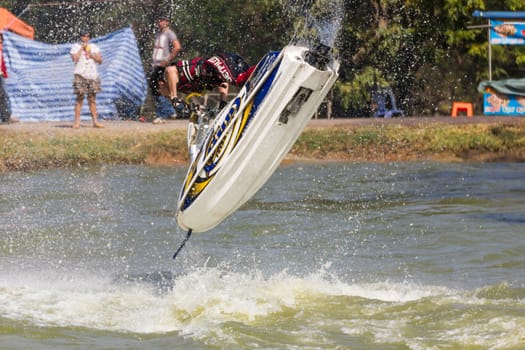 SARABURI THAILAND-JANUARY 20: Sonswut Rappasubpisan in action during show Freestyle the Jet ski  stunt action  on Jan 20, 2013 in SARABURI,Thailand.