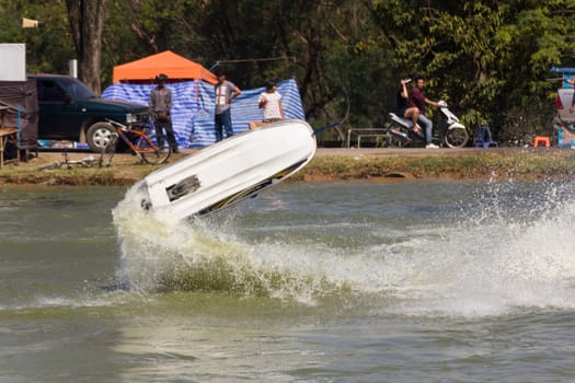 SARABURI THAILAND-JANUARY 20: Sonswut Rappasubpisan in action during show Freestyle the Jet ski  stunt action  on Jan 20, 2013 in SARABURI,Thailand.