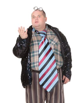 Fun portrait of an obese man with an outrageous fashion sense wearing a mixture of stripes, checks and spangles topped by an oversized flamboyant tie, on white