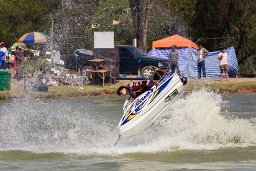SARABURI THAILAND-JANUARY 20: Sonswut Rappasubpisan in action during show Freestyle the Jet ski  stunt action  on Jan 20, 2013 in SARABURI,Thailand.