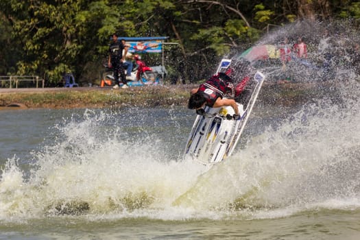 SARABURI THAILAND-JANUARY 20: Sonswut Rappasubpisan in action during show Freestyle the Jet ski  stunt action  on Jan 20, 2013 in SARABURI,Thailand.