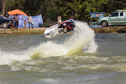 SARABURI THAILAND-JANUARY 20: Sonswut Rappasubpisan in action during show Freestyle the Jet ski  stunt action  on Jan 20, 2013 in SARABURI,Thailand.