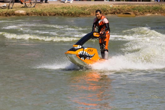 SARABURI THAILAND-JANUARY 20: Boonlue Korbangyang in action during show Freestyle the Jet ski  stunt action  on Jan 20, 2013 in SARABURI,Thailand.