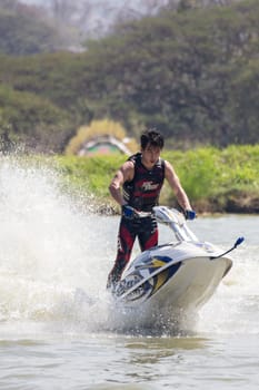 SARABURI THAILAND-JANUARY 20: Sonswut Rappasubpisan in action during show Freestyle the Jet ski  stunt action  on Jan 20, 2013 in SARABURI,Thailand.