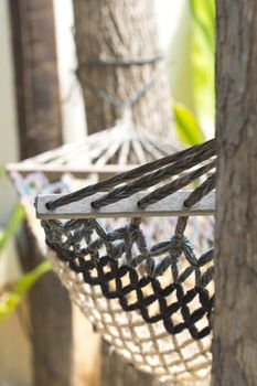 White crib sleeping under a tree romantic.