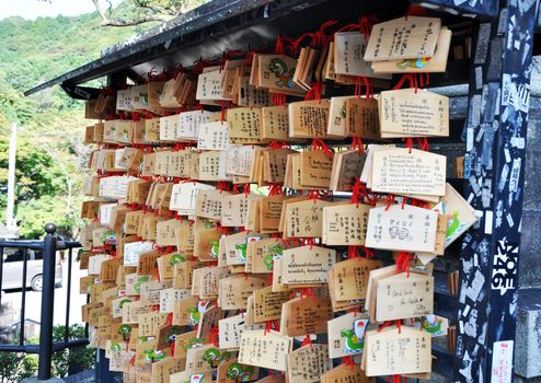 Wooden prayer tablets in a japanese temple (Kyoto, Japan) 