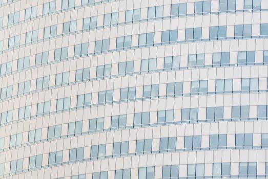 Detail of skyscraper windows in Warsaw, Poland.