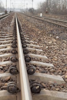 Daylight photograph of railway track.