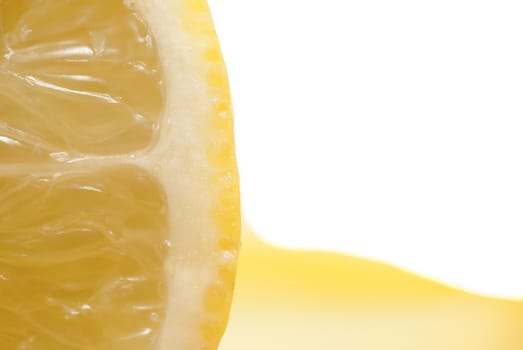 Cross section of sliced lemon in a glass.