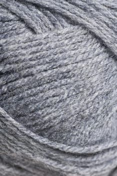 Grey knitting wool, close crop.