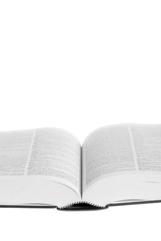 Large book open against white background.