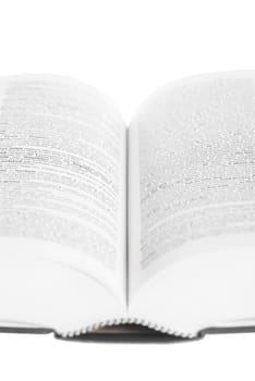 Large book open against white background.