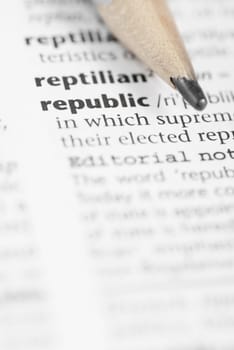 Macro image of dictionary word: Republic and Pencil