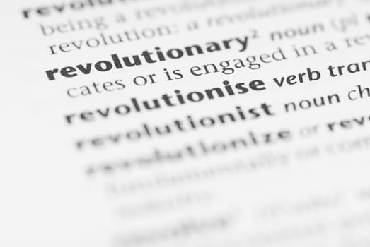 Macro image of dictionary word: Revolutionary.