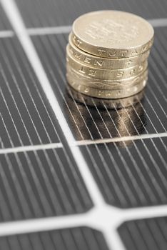 Macro image of Photovoltaic solar panel. Money ££'s.