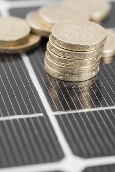 Macro image of Photovoltaic solar panel. Money ££'s.