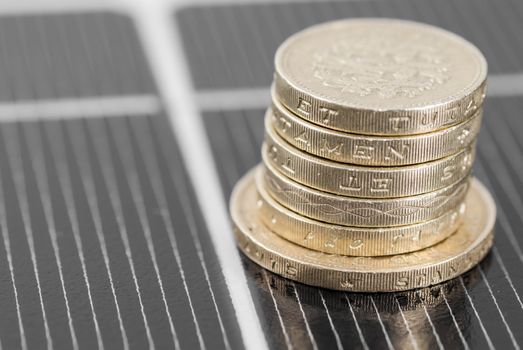 Macro image of Photovoltaic solar panel. Money ££'s.