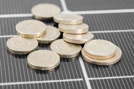 Macro image of Photovoltaic solar panel. Money ££'s.