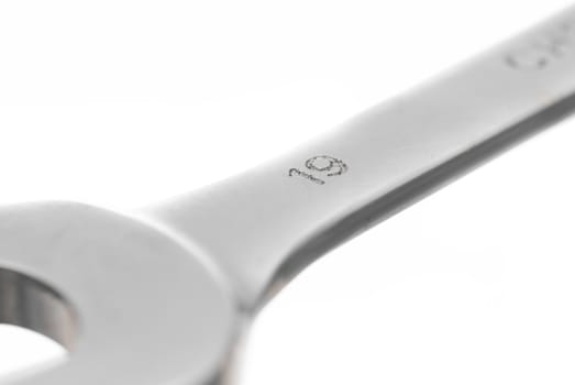 Detail of 19mm Spanner, white background.