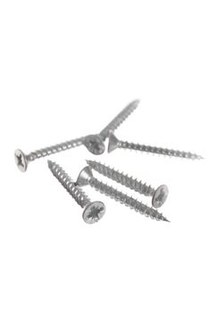 Collection of new metal screws on white background.