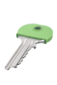 One green house key, white background.