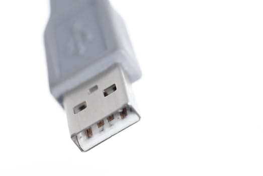 Macro image of one USB connector on white background.