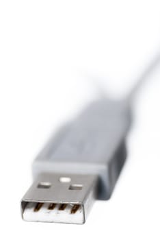 Macro image of one USB connector on white background.