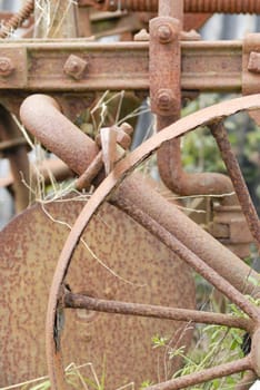Rusty Wheel of Old Farm Machinery.