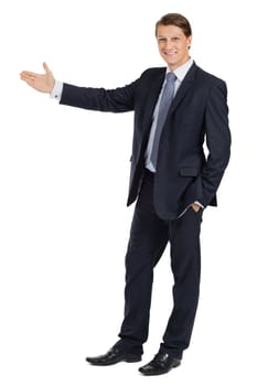 Photo of a handsome young businessman pointing to something.
