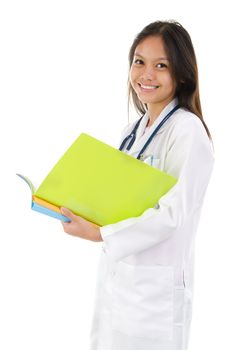Portrait of a smiling female medical student with confident smile standing isolated on white background, model is a southeast asian woman.
