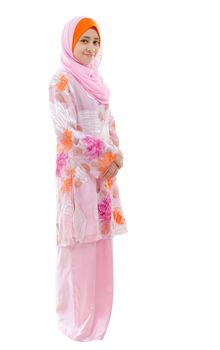 Portrait of full body Southeast Asian Muslim girl smiling, standing on white background
