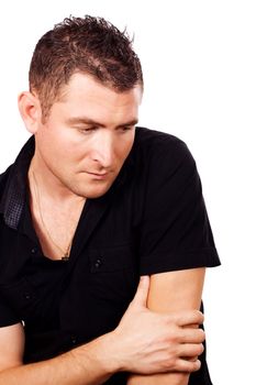 A young man in a black shirt, deep in thought on a white background
