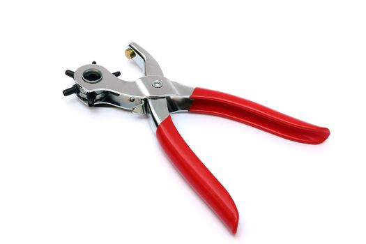 Punching plier with red handle on white background 