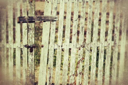 old wooden fence with a gate 