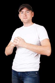 Serious Hispanic man wearing cap
