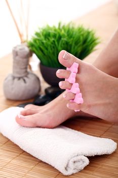 Image of SPA pedicure on bamboo surface