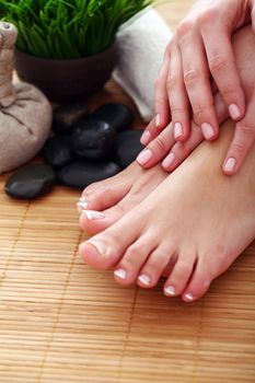 Image of SPA pedicure on bamboo surface