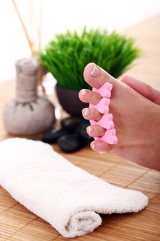 Image of SPA pedicure on bamboo surface