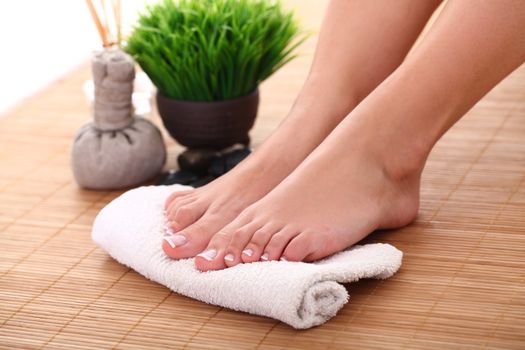 Image of SPA pedicure on bamboo surface