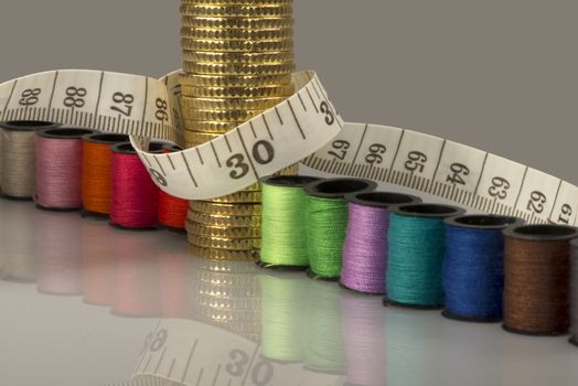 Tailoring costs represented by coins, threads and meters