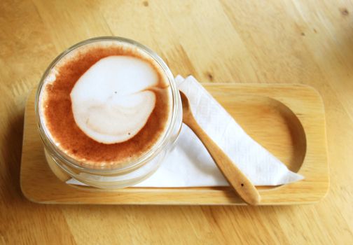 Cup of hot chocolate with creamy milk 