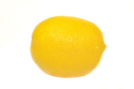 Isolated ripe  lemon on the white background