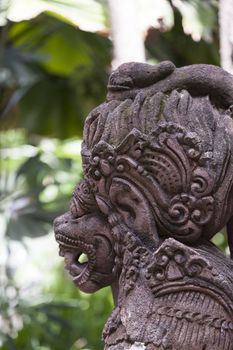 Traditional Balinese God statue in a Bali temple