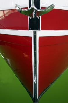 Front view of a red boat close up
