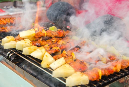 bbq stick with peper on stove