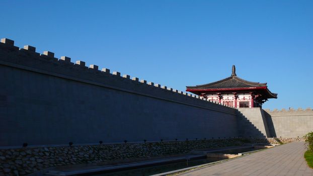 Ancient city wall of Xian China against blue sky