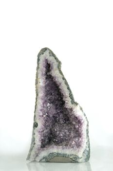 Amethyst geode isolated with white background