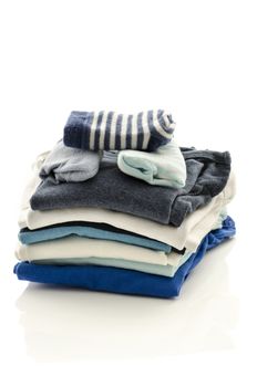 Baby boy clothes with socks isolated on a white background.